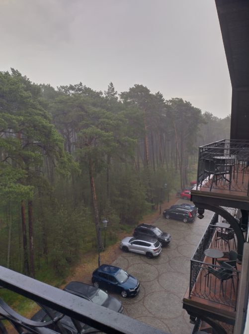 Looking at the rain from the balcony